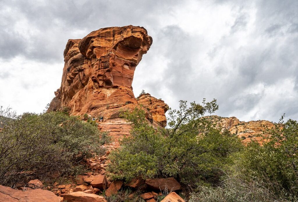 The Fay Canyon trail in Sedona ends at this cliff - note the people who have scampered up