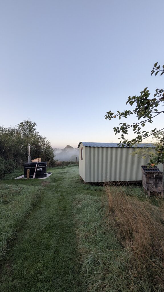 Early morning exterior shot of Dragon's Hut glamping in Wrexham