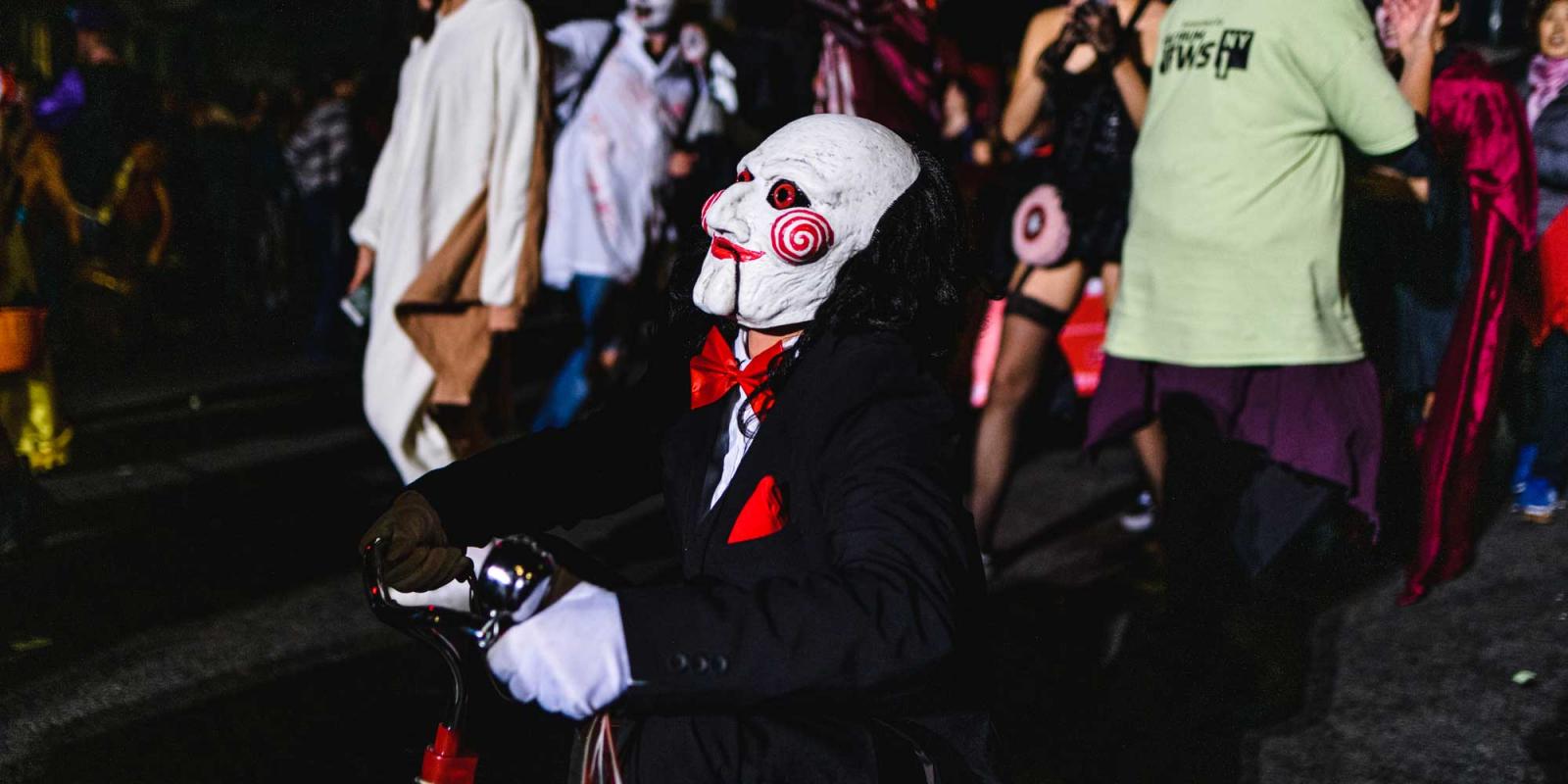 SAW costume in nyc during the parade on halloween