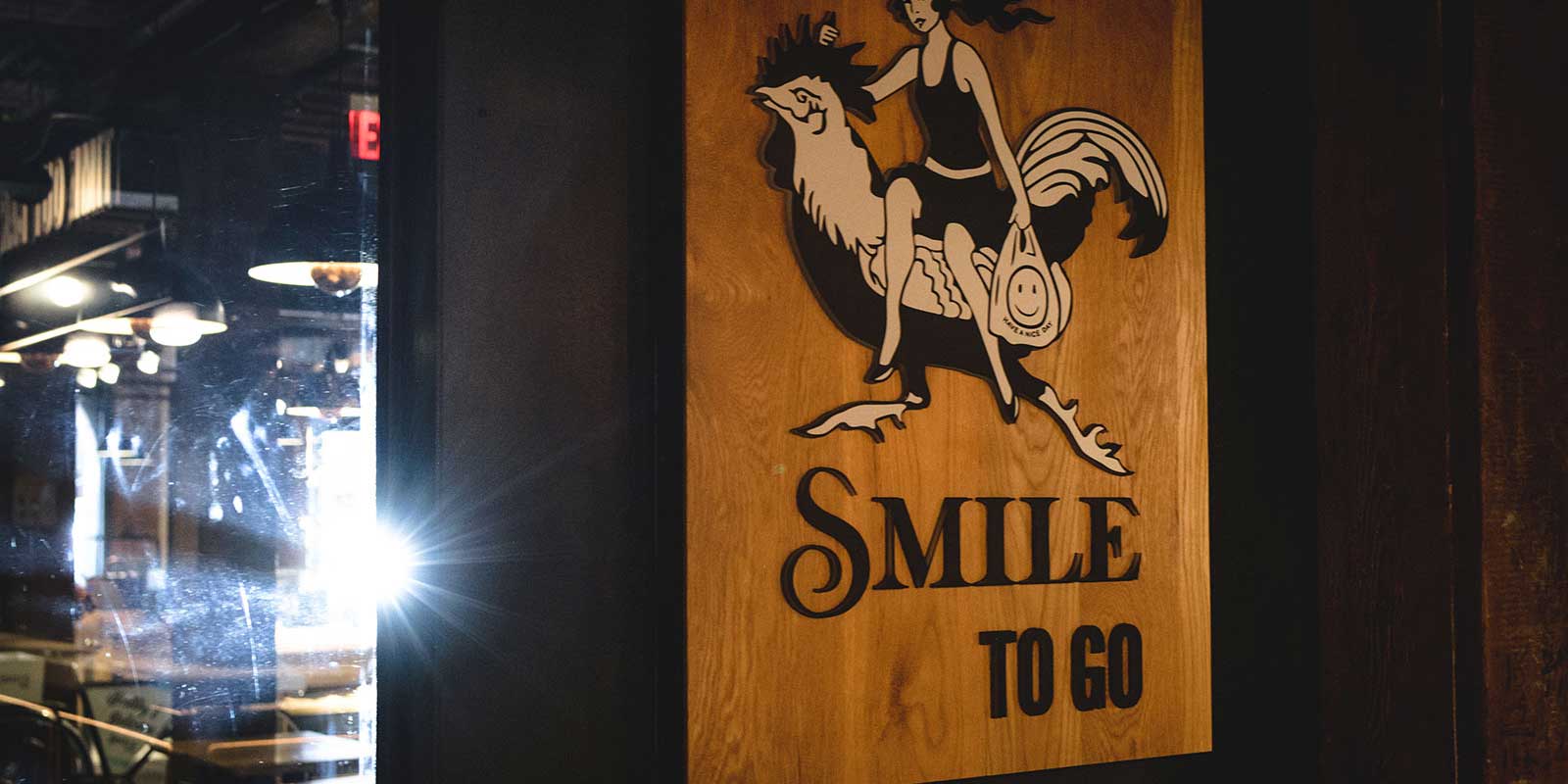 Smile to go sign