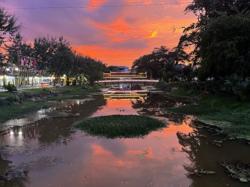 sunset over the river in Siem Reap Town