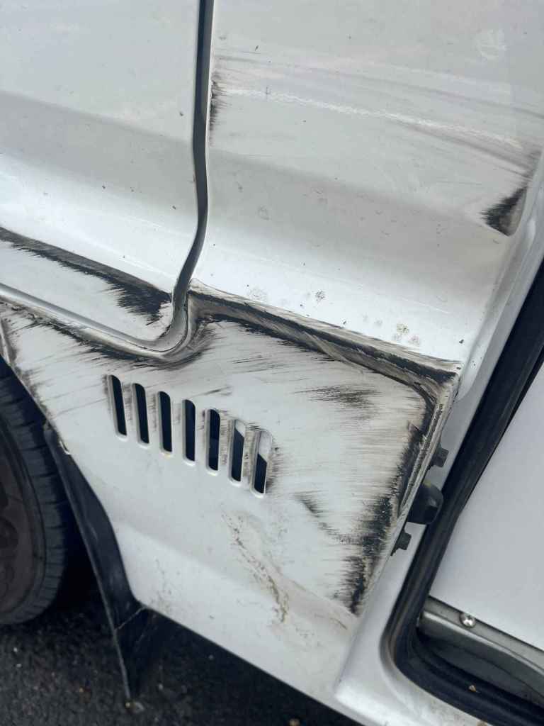 side panel damage to the van