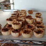 Roguetrippers enjoy the butter tarts at Impressions bakery.