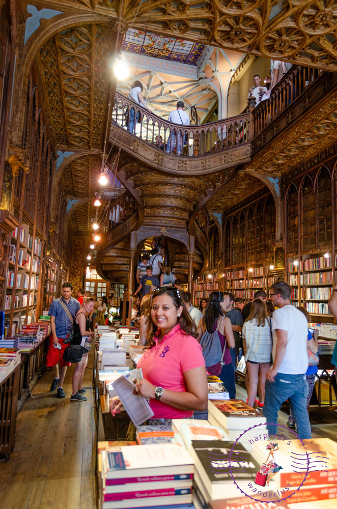 Harpreet in Livario Lello perusing books